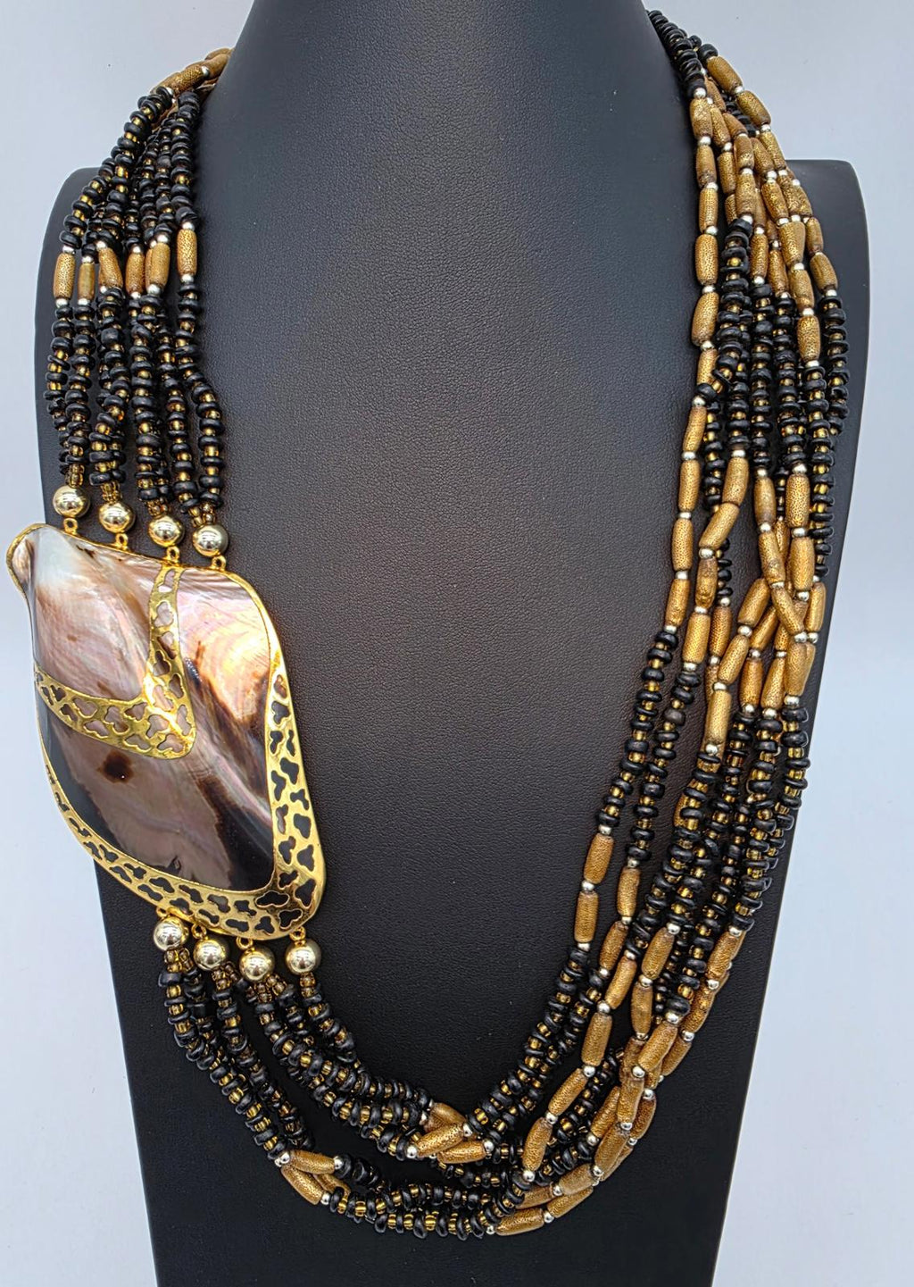 Melo Shell Mother of Pearl Multi Strand Gold Filigree Necklace Black and Gold